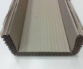 Protective profile of the multi-layered corrugated cardboard